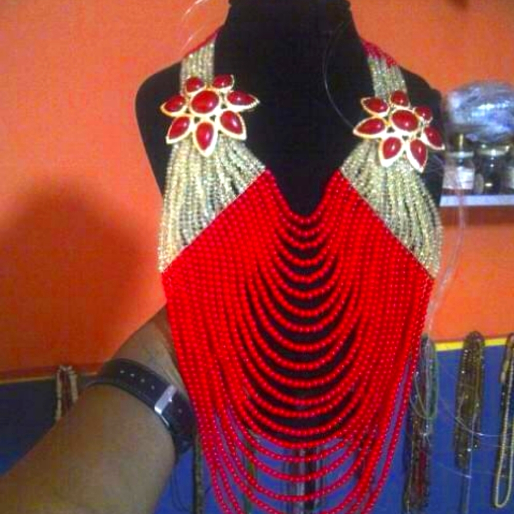 Handmade crystal and coral beaded necklace set.